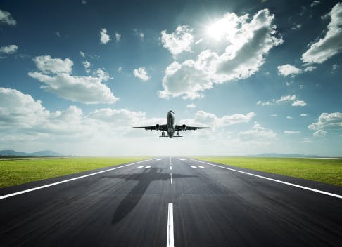 Aeroplane taking off on a sunny day
